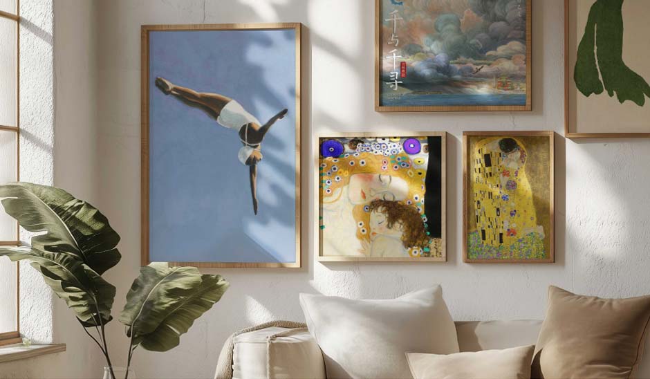 A stylish gallery wall featuring artworks by Klimt and modern illustrations in soft colours.